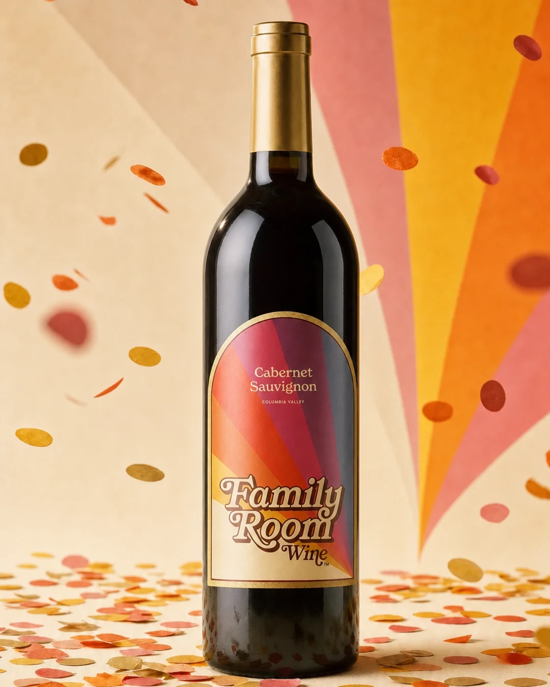 A bottle of Family Room Cabernet Sauvignon with confetti falling